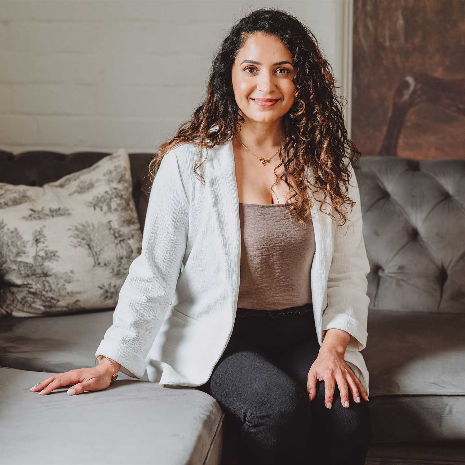 BABCP Psychotherapist sat on a couch